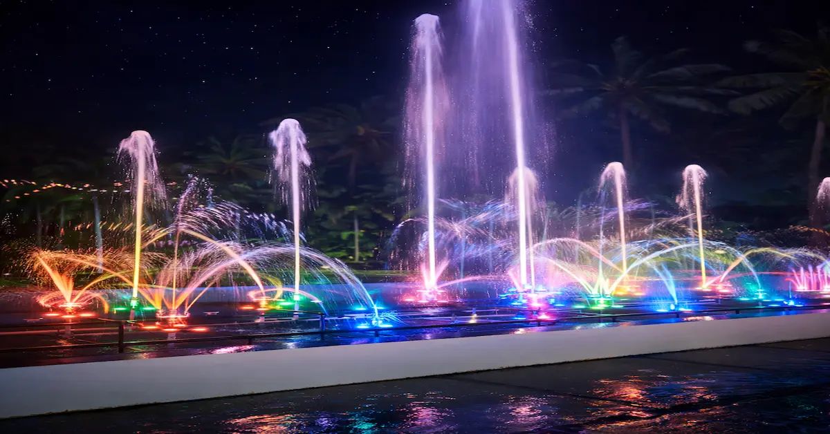 Colorful musical fountain and water show at Yellow Garden, Port Blair, featuring illuminated water jets creating a magical evening atmosphere.