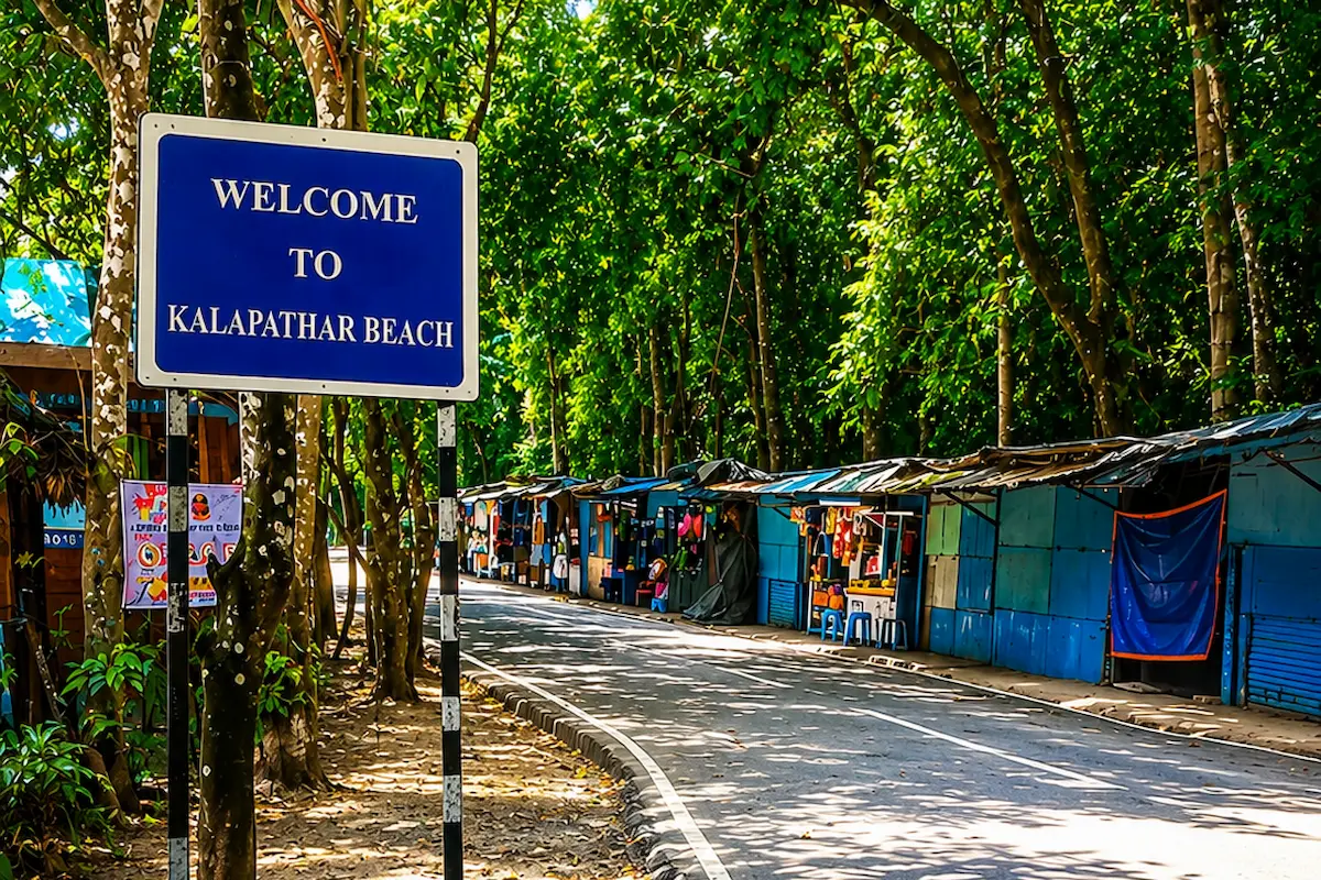 Welcome to Kalapathar Beach Entrance Road | Havelock Island Welcome to Kalapathar Beach signboard along the lush green road with local shops in Havelock Island, Andaman and Nicobar Islands.