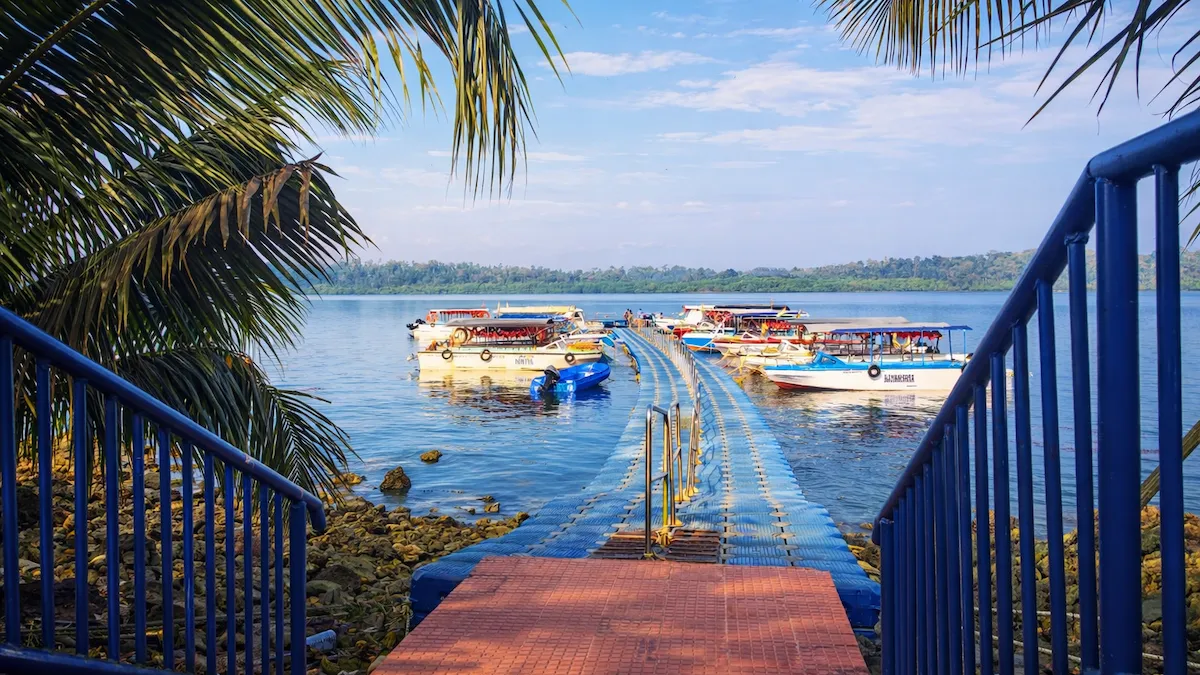 Ross and Smith Island: The Twin Paradise You Won't Believe Exists Aerial Bay Floating Jetty with fiber boats for Ross and Smith Island in Diglipur, North Andaman.